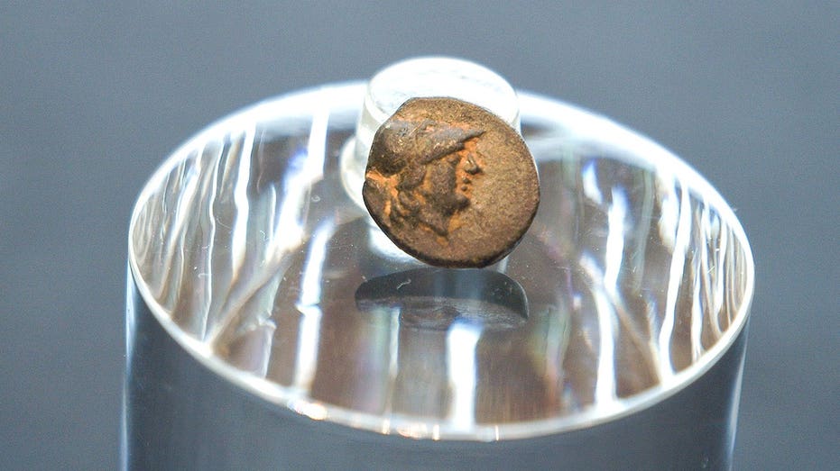 Teen stumbles on mysterious coin from legendary city, puzzling archaeologists over its journey Adelaide Accountant